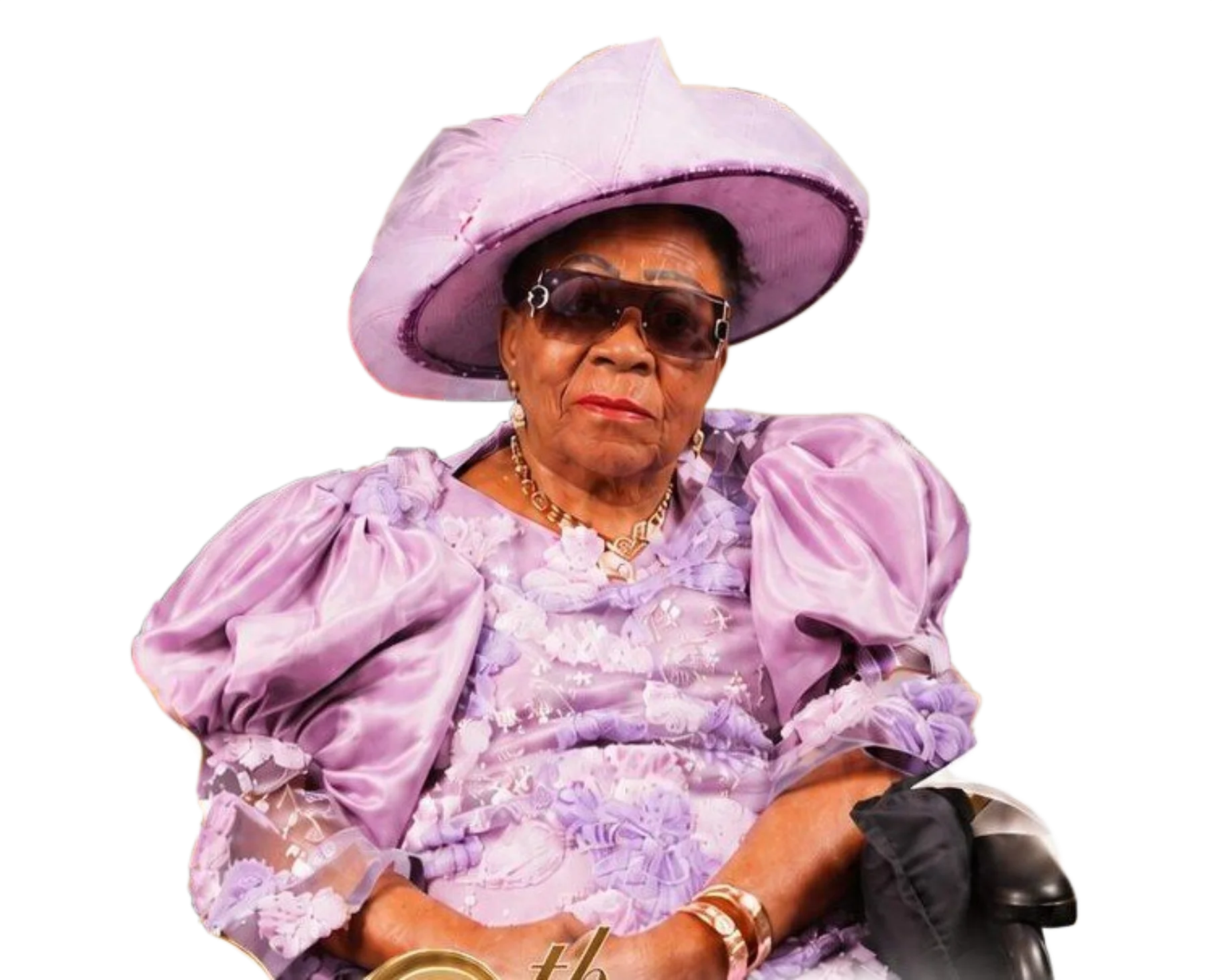 Ezinne Grace Unachukwu in a lilac lace gown and wide-brimmed hat